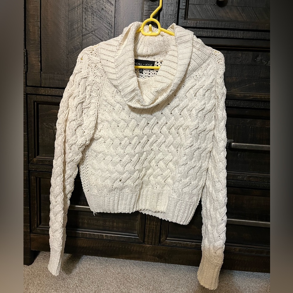 Kendall & Kylie cream cropped sweater.